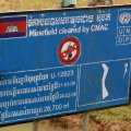 image 074-cleared-minefield-sign-near-path-to-phnom-chhnork-cave-jpg