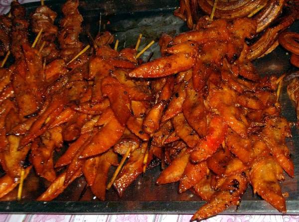 image 063-local-delicacy-at-the-night-market-bbqd-chicken-wing-tips-sihanoukville-jpg