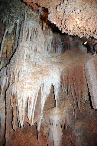 image 23-assorted-speleothems-below-a-cave-coral-formation-jpg
