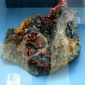 image 040-red-vanadinite-on-goethite-morocco-jpg