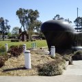 image holbrook-hmas-otway-with-submariners-memorial-in-the-background-jpg