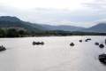 023-Cham-Khmer-fishing-boats-heading-down-Kampot-River-for-night-fishing