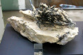 043-Stibnite-crystals-on-quartz-China