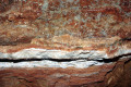 10-Phosphate-in-rock-white-layer-under-layer-of-Calcite-crystals