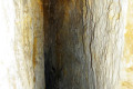 06-Very-high-and-narrow-passage-leading-to-cave-chamber
