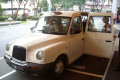 077-stepping-into-a-London-cab-at-Pan-Pacific