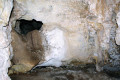 34-Speleothem-growing-out-of-a-hole-in-cave-wall